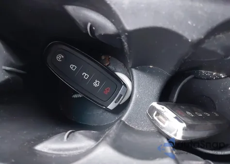 2015 Ford Focus Titanium z USA, uszkodzony, nr VIN 1FADP3N28FL268901